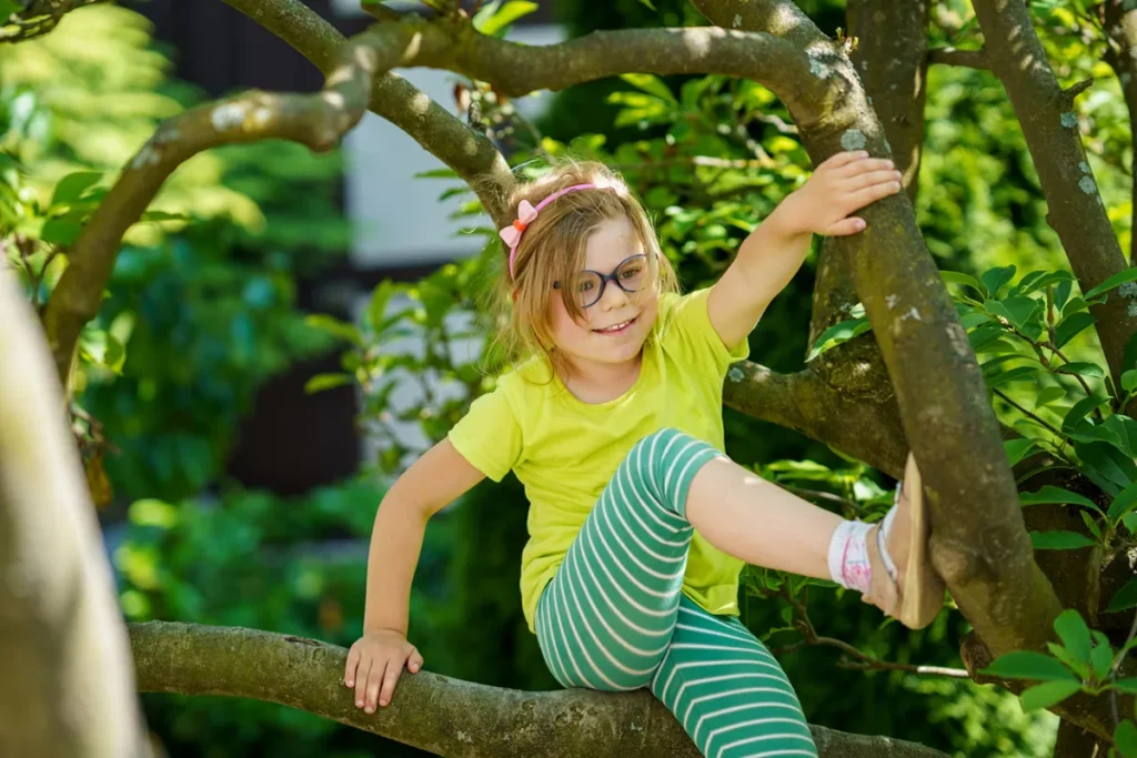 Girl Climbing A Tree. Is It Safe?